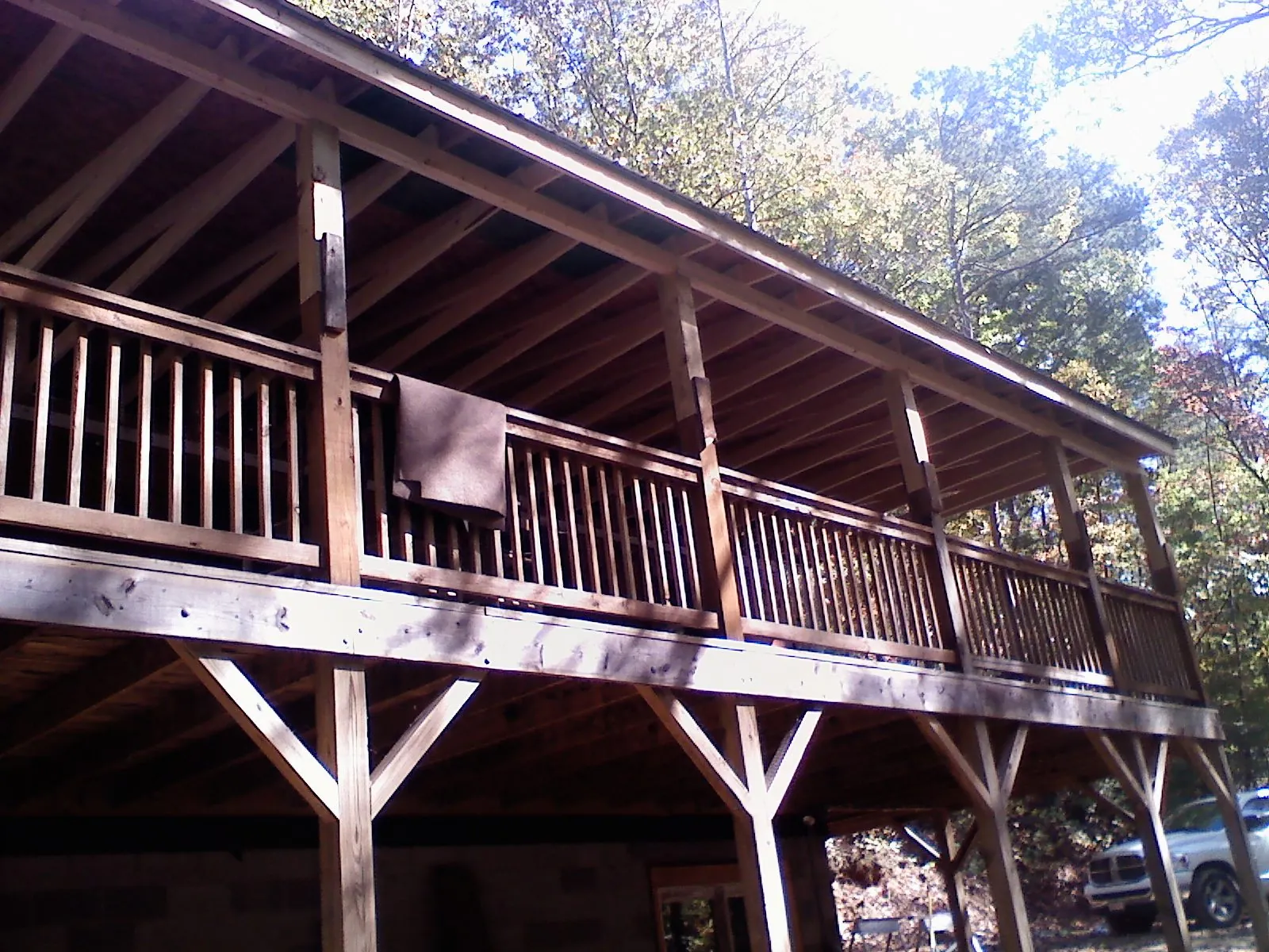 Timber framing under a new elevated porch and deck — Roof Leak Repair in Rosemary Beach by Roofing Brothers
